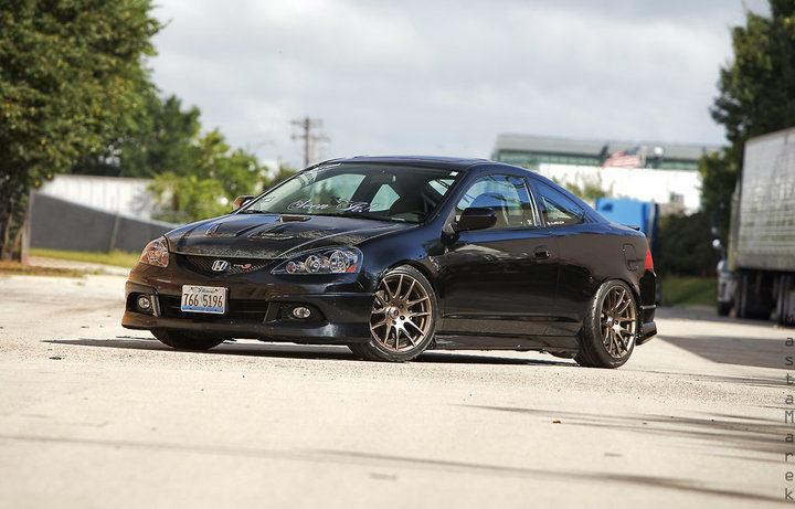 black acura rsx with gold rims